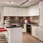 Квартира студия позволяет совместить гостинную и кухню в одном пространстве