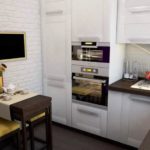 На этом фото удачное размещение встроенной техники в малогабаритной кухне гостинной