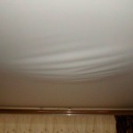 Провисание натяжного потолка